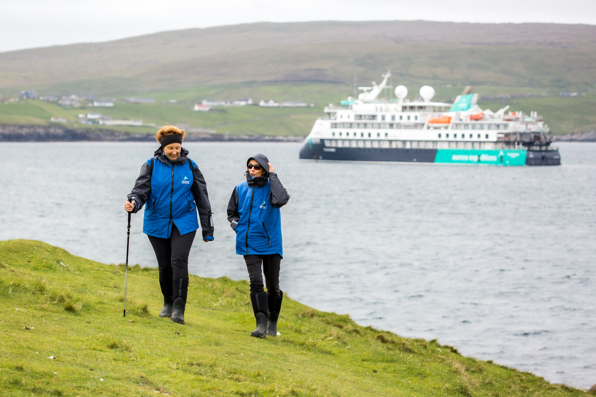 Passengers Hiking and the Sylvia Earle, Mousa, Scotland, Pia Harboure Passengers Hiking and the Sylvia Earle, Mousa, Scotland, Pia Harboure